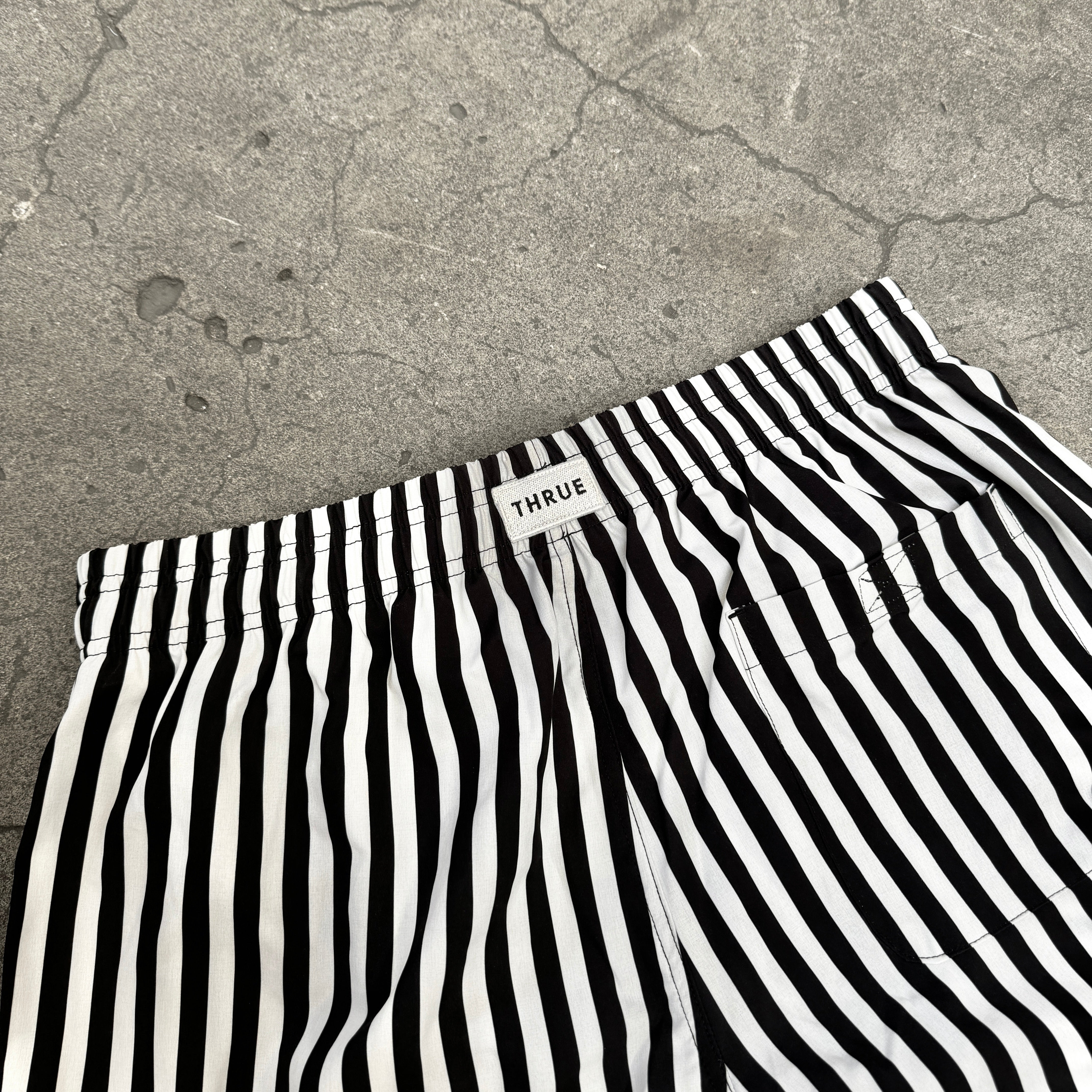 STRIPED SWIM SHORTS